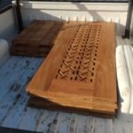 Timber door panels and turned balusters loaded for delivery
