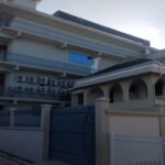 Completed multi-storey building in Dar es Salaam with external timber and finishing works by Simba Umeme