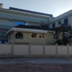 Exterior of a completed Dar es Salaam building showing external works