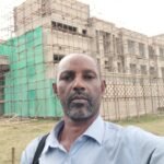 Simba Umeme management on site at a building under construction