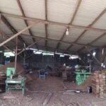 Inside the Simba Umeme timber workshop in Dar es Salaam, with saw benches and planing machines