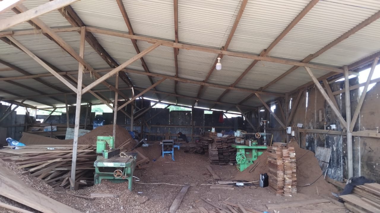 Inside the Simba Umeme timber workshop in Dar es Salaam, with saw benches and planing machines