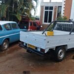 Simba Umeme workshop yard with company vehicles used for external works