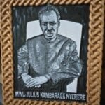 Hand-carved relief portrait of Mwalimu Julius Kambarage Nyerere in a plaited hardwood frame
